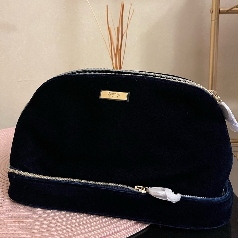 Cle de peau beauty bag in velvet
